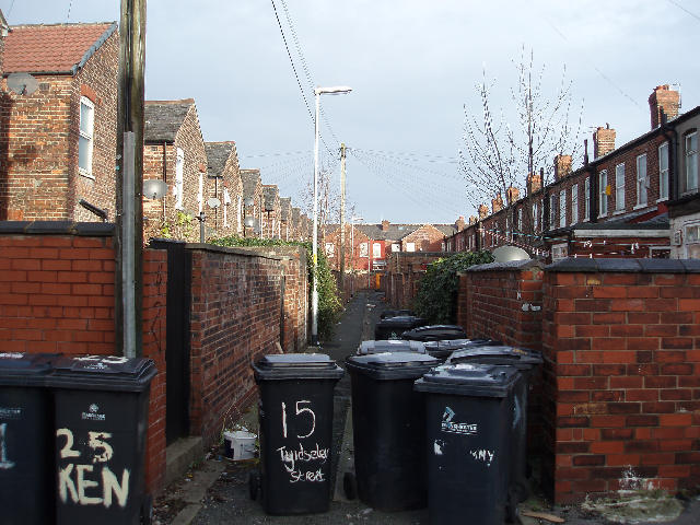 Free Stock Photo: moss side: wheelie bins line the back streets of urban manchester