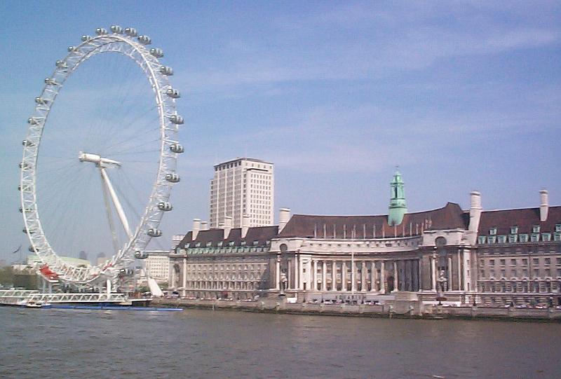 Free Stock Photo: London Eye ferris wheel on the bank of the River Thames in London with its ovoid passenger gondolas from which to observe the city