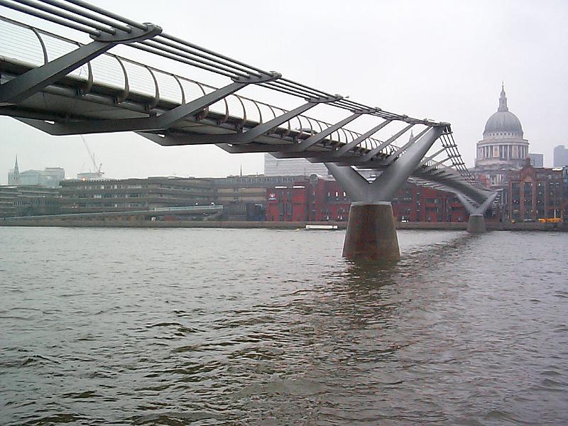 Free Stock Photo: Millennium Bridge, London spanning the River Thames viewed from water level looking towards St Paul's Cathedral