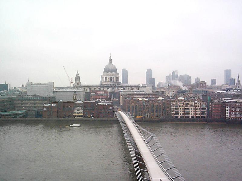 Free Stock Photo: High angle view of the Millennium Bridge crossing the River Thames in London, UK on a misty cold day