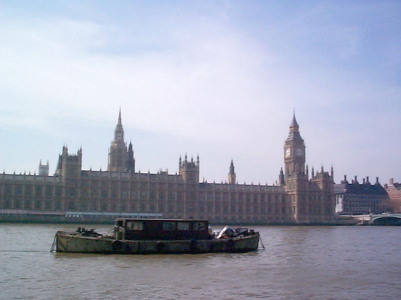 Free Stock Photo: Barge in River Thames in front of Historic Palace of Westminster Parliament Buildings on Sunny Day with Blue Sky, London, England
