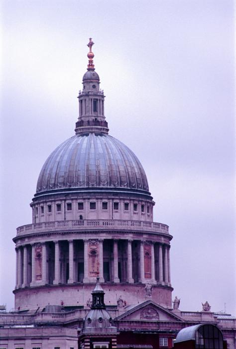 Free Stock Photo: The domed roof of St Pauls Cathedral, London, at twilight lit by a lilac light against an overcast sky