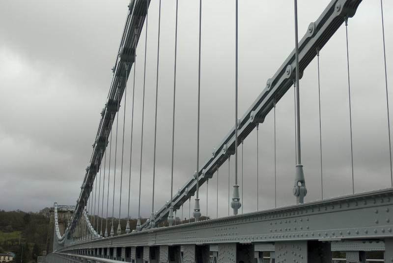 Free Stock Photo: Metal suspension links on a long bridge span in close up detail in a structural engineering concept