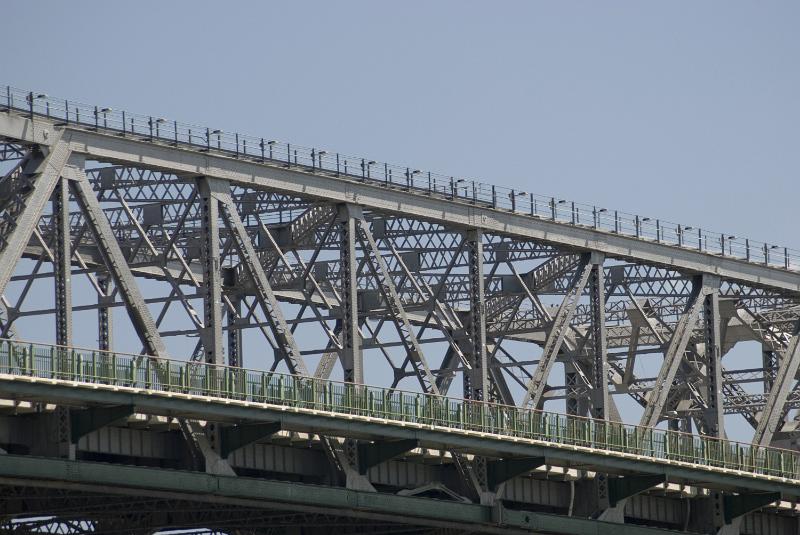 Free Stock Photo: Detail showing the span of a truss bridge against a clear sky in an architectural or structural engineering concept