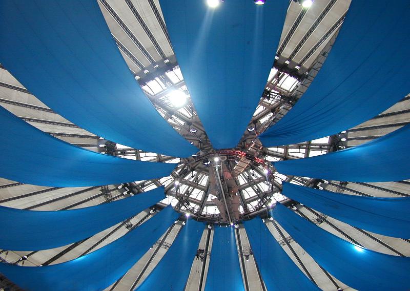 Free Stock Photo: Looking into the apex of the Big Top marquis at a circus with blue canvas and visible framework with spotlights