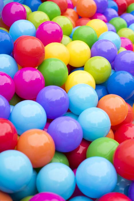 Free Stock Photo: A close up of multicoloured plastic balls in a ball pit.