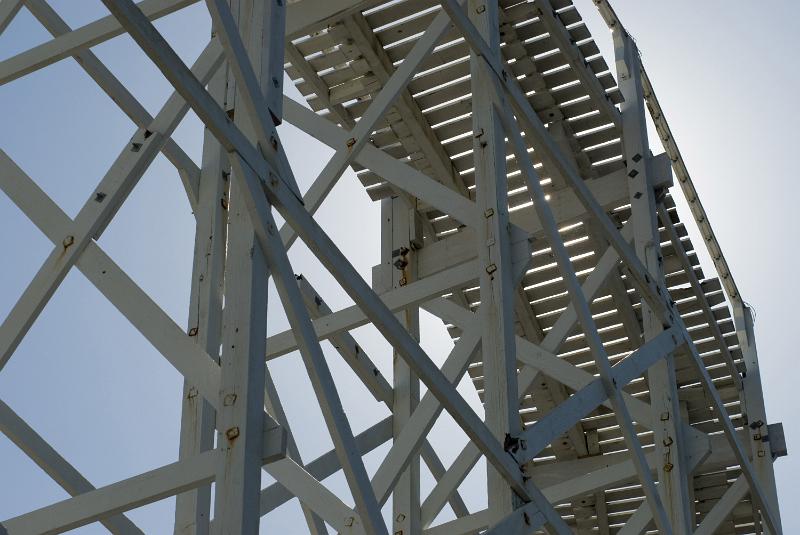 Free Stock Photo: A close up of an overhead roller coast frame and supporting structure.