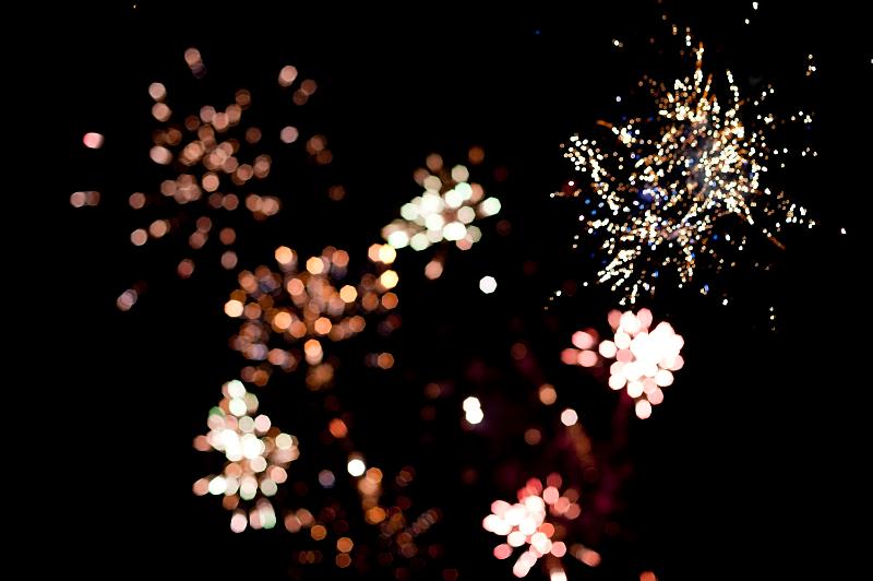 Free Stock Photo: Fireworks display background with a bokeh of colourful bursting rockets in a dark night sky celebrating a festival or special event