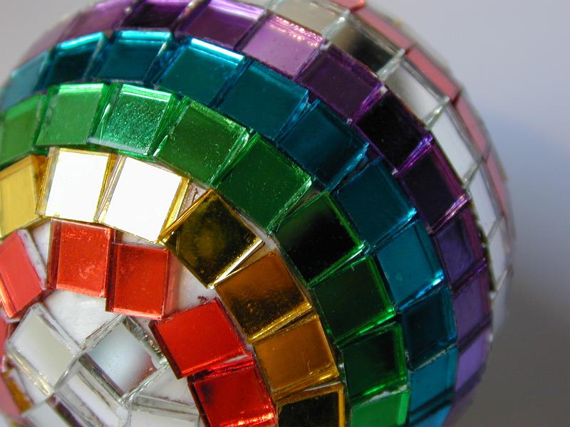 Free Stock Photo: Detail of Festive Disco Ball Bauble Decorated with Colorful Mirrored Tiles in Rainbow Pattern