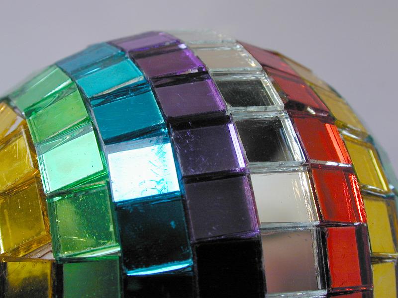 Free Stock Photo: Colorful Christmas bauble with mosaic mirror tiles in the colors of the rainbow, close up view