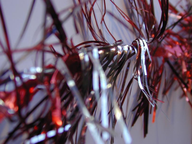 Free Stock Photo: Extreme close up view of festive red and silver tinsel