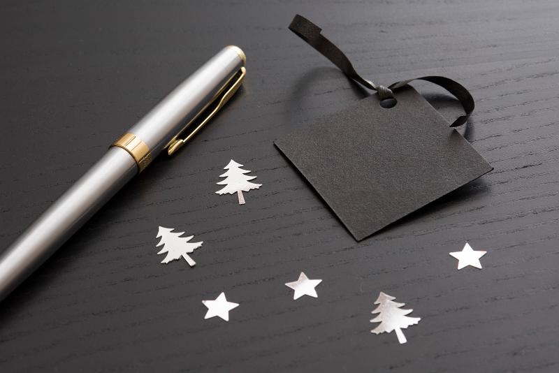 Download image of blank gift tag and pen Free Stock Photo: a pen and blank gift tag waiting to be written