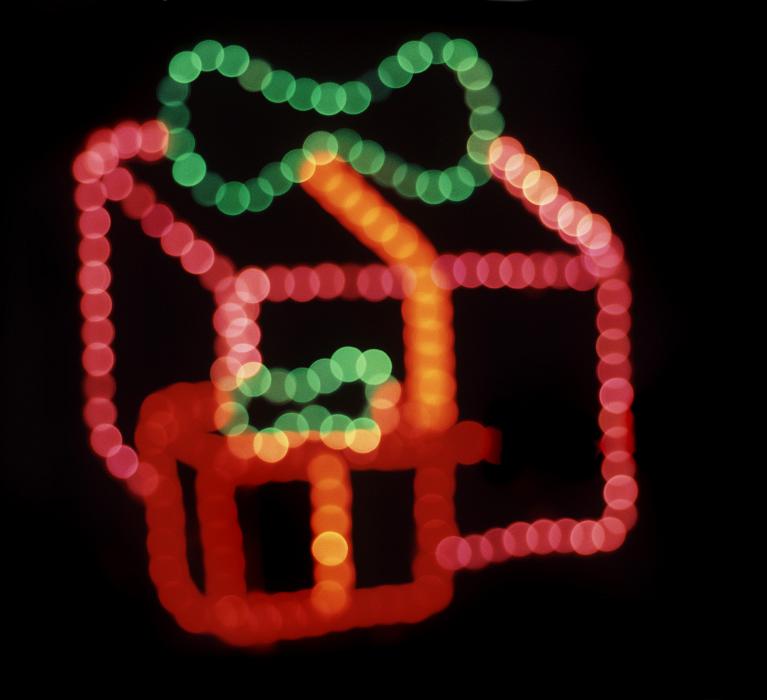 Free Stock Photo: christmas lights in the shape of some colorful parcels with a ribbon bow