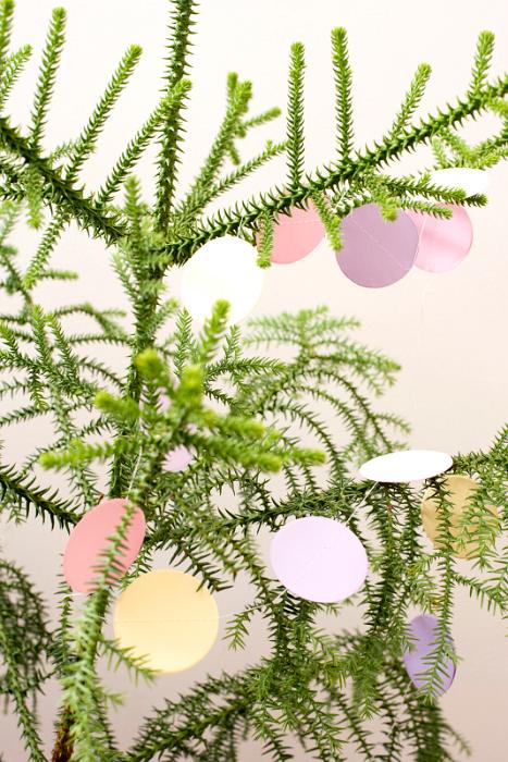 Download image of decorated with paper decorations Free Stock Photo: paper decorating on a minimally decorated tree, plastic free environementally friendly christmas concept