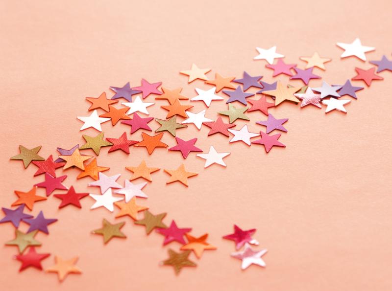 Free Stock Photo: High angle view of mutlicolored star decorations on pink background