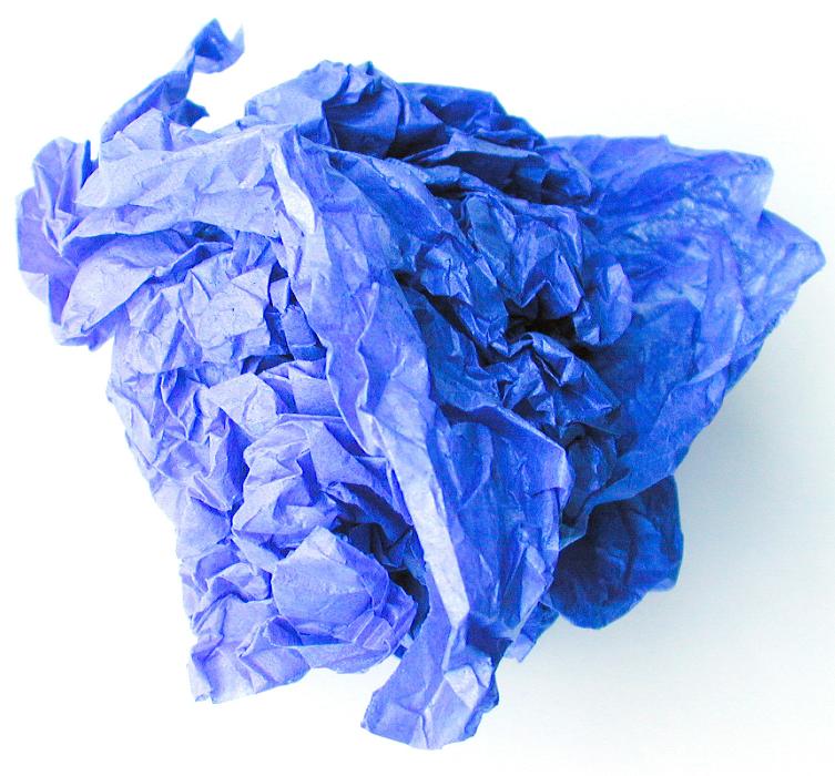 Free Stock Photo: Close up of scrunched up blue tissue wrapping paper on white background