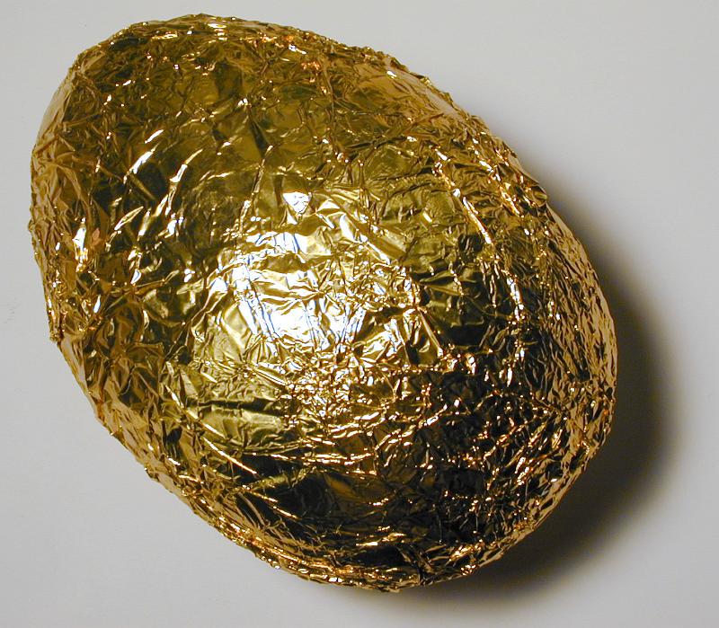 Free Stock Photo: a gold foil wrapped chocolate easter egg