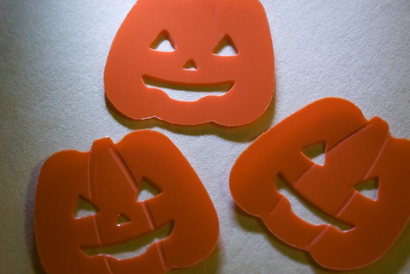 Free Stock Photo: jack-o-lantern halloween shapes with smiles, lit with angled light from above