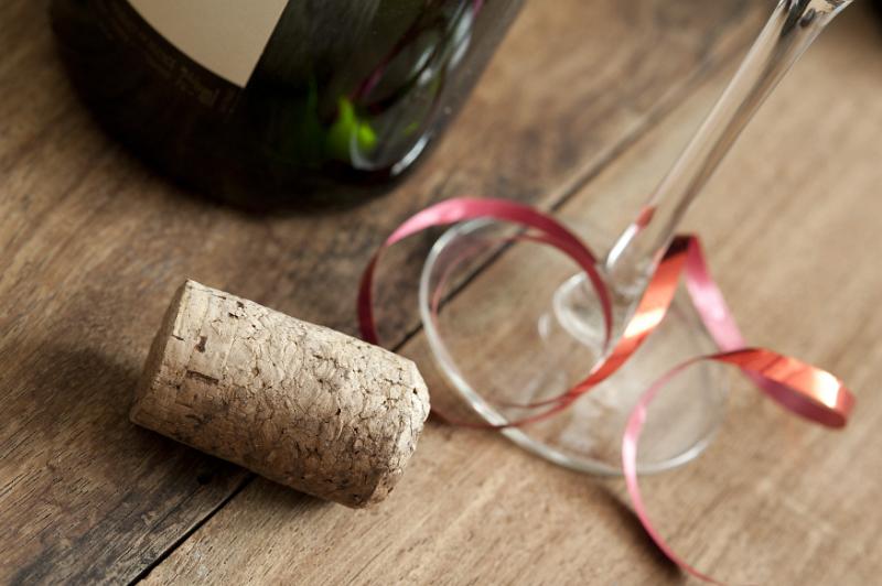 Free Stock Photo: Celebration new years with champagne, close-up view of cork on wooden table near glass and wine bottle