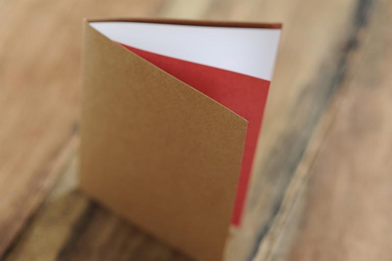 Free Stock Photo: Close up Empty Brown Homemade Party Invitation Card Standing on Top of a Wooden Table