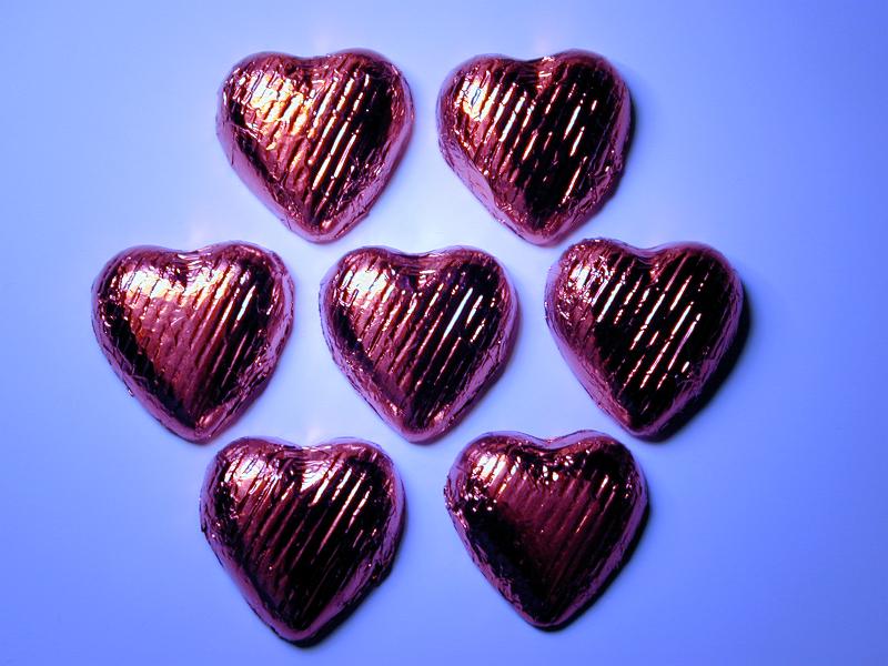 Free Stock Photo: a circle of chocolate hearts with a single heart in the centre