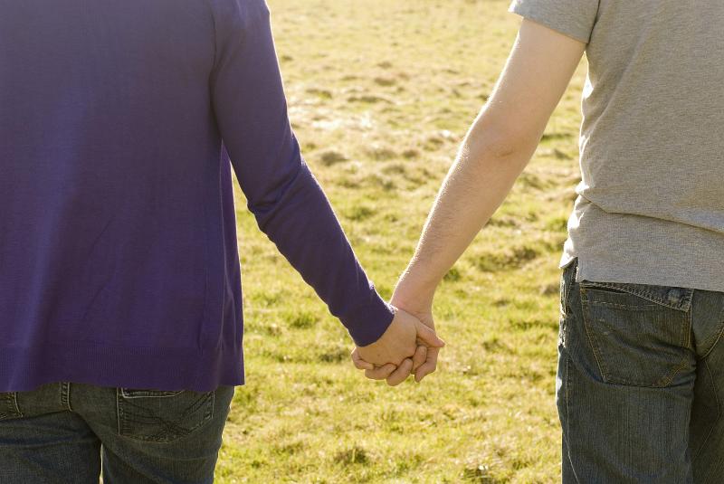 Free Stock Photo: a romantic couple holding hands in love
