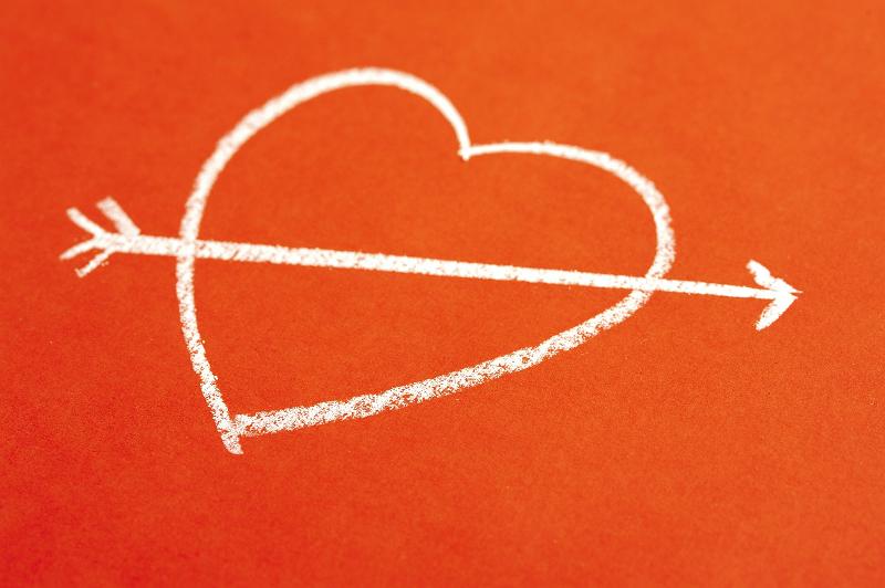 Download image of love heart and arrow Free Stock Photo: a chalk love heart symbol shot by cupids arrow, concept of romance