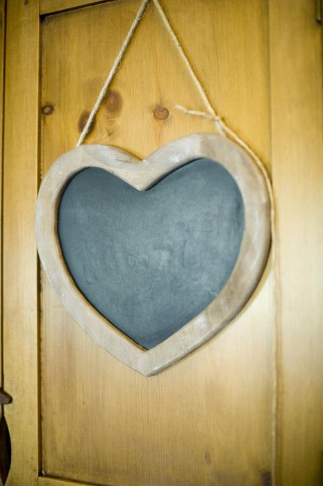 Free Stock Photo: a wooden heart shaped blackboard with room to add a couple of names