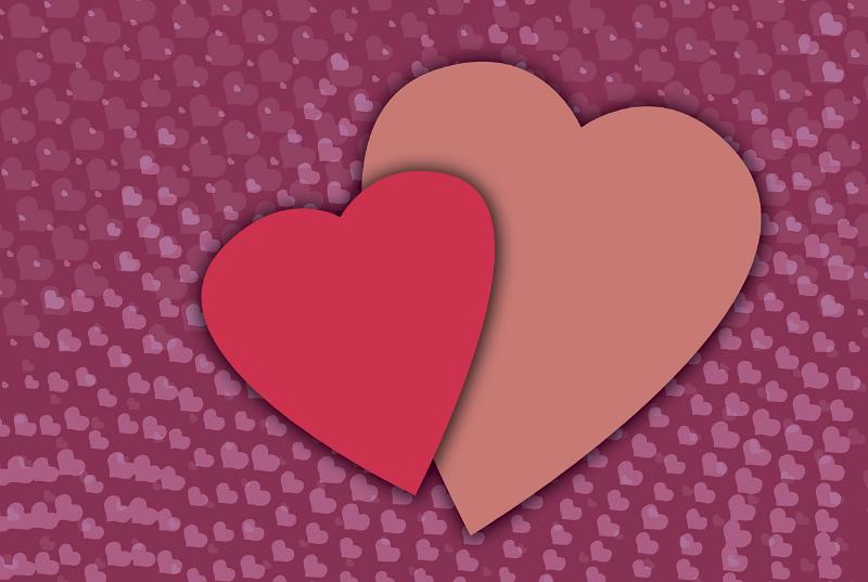 Free Stock Photo: two love heart shapes of a background of smaller love hearts