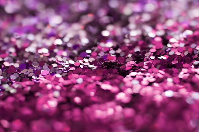 Free Stock Photo: Close-up image of pile of pink and purple shiny glitter or sequins with tilt shift selective focus blur effect. Full frame background concept