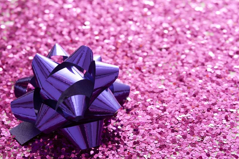 Free Stock Photo: Close-up full frame image of glossy purple ribbon on gift box covered with pink glitter