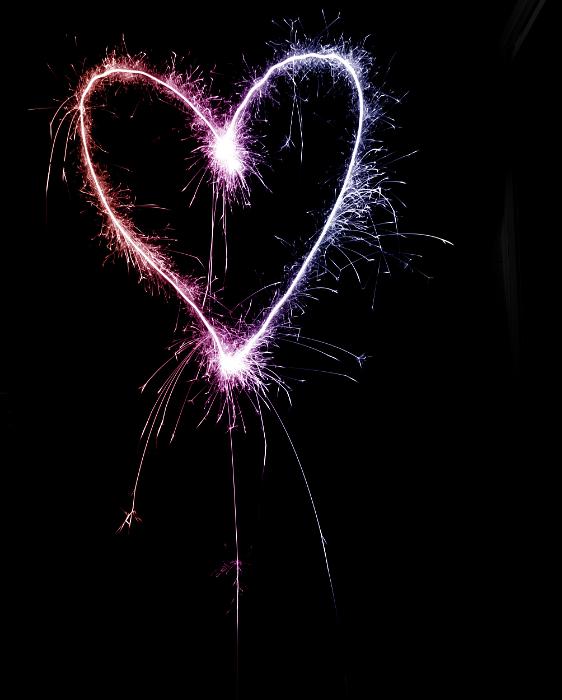 Free Stock Photo: a pink and purple coloured love heart shape drawn with a sparkler