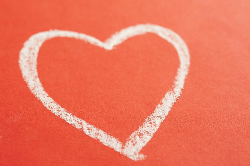 Free Stock Photo: a simple chalk drawn heart shape on a red surface with space for a message