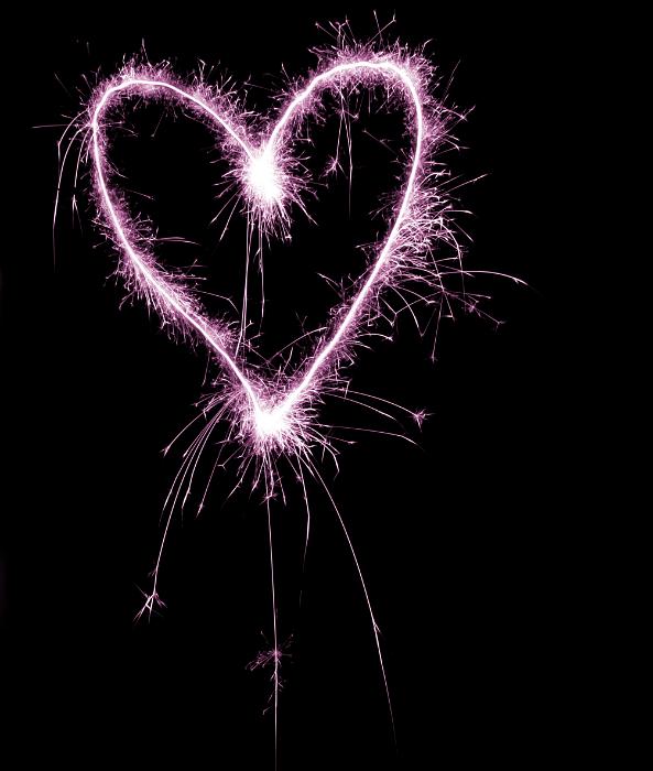 Free Stock Photo: a pink coloured sparkling love heart valentine concept image on a black background