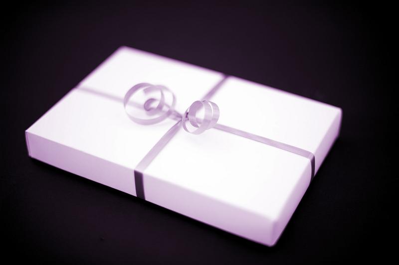 Free Stock Photo: a pink wrapped gift with ribbon and bow