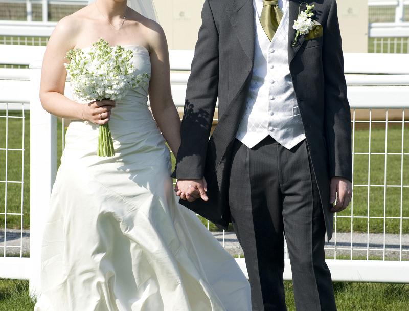 Free Stock Photo: the bride and groom holding hands after the wedding ceremony