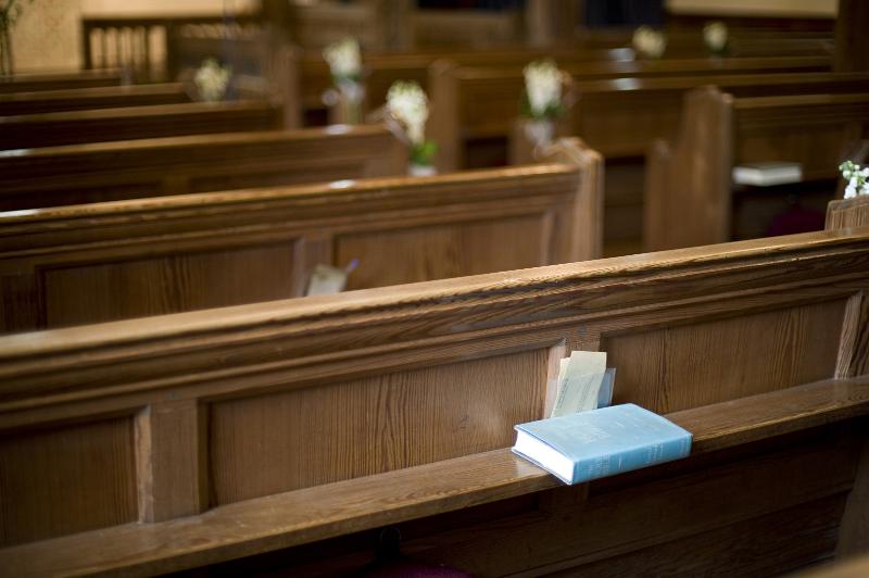 Free Stock Photo: rows of church pews and a bible