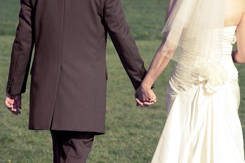 Free Stock Photo: a bride and groom holding hands