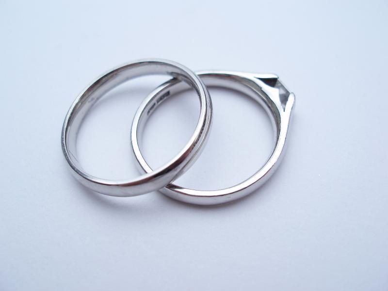 Free Stock Photo: two wedding rings on a light coloured background
