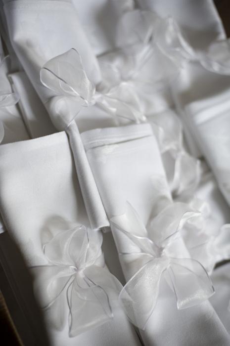 Free Stock Photo: white linnen napkins wrapped with ribbons