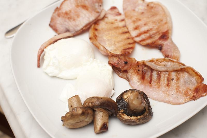Free Stock Photo: Cooked breakfast of bacon, fried eggs and mushroom served on a plate for a nutritional start to the day