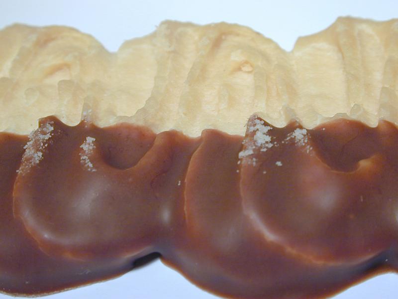 Free Stock Photo: Close-Up of Chocolate Dipped Pastry Dessert on White Background