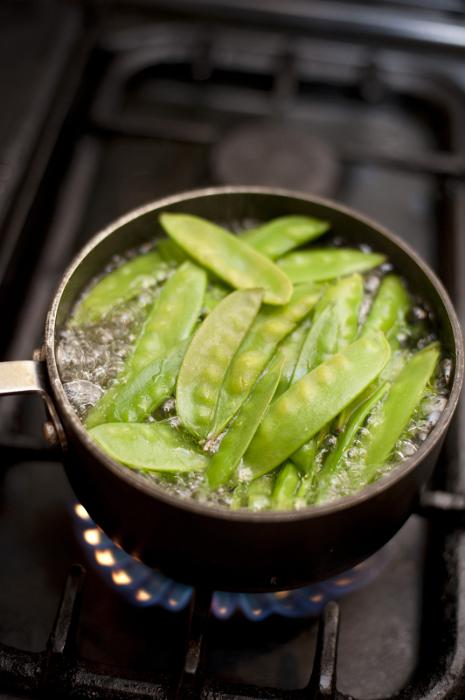 Free Stock Photo: Cooking mangetout peas in a pot of boiling water on a gas hob, high angle view