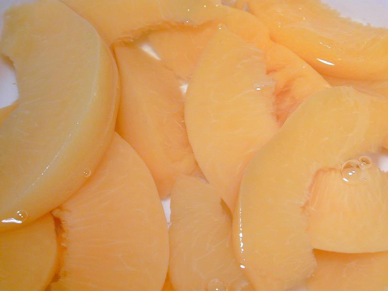 Free Stock Photo: Background texture of canned peach slices in juice ready to be served for dessert