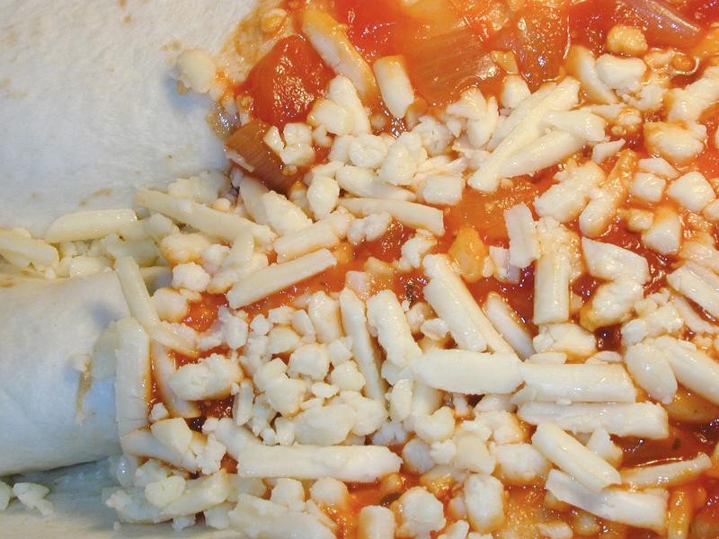 Free Stock Photo: pizza toppings closeup on tomato paste and grated cheese