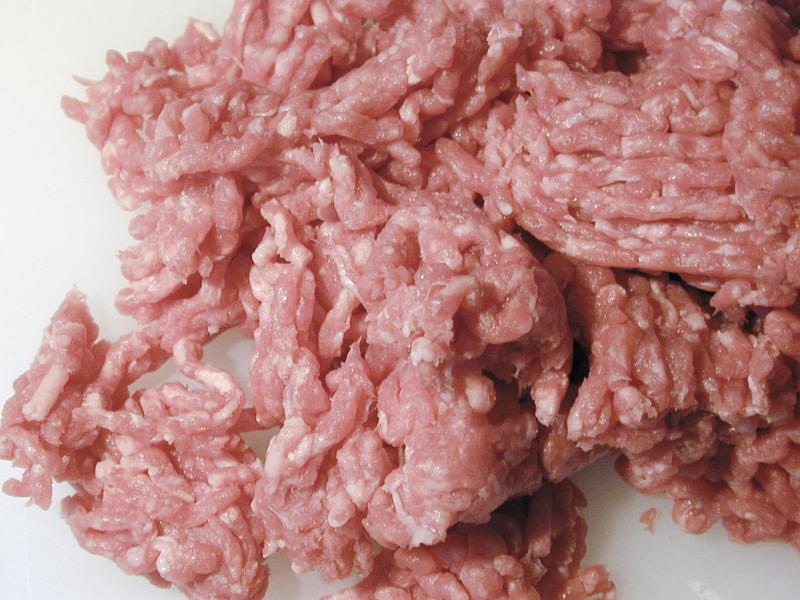 Free Stock Photo: Background texture of raw minced meat waiting to be cooked on white