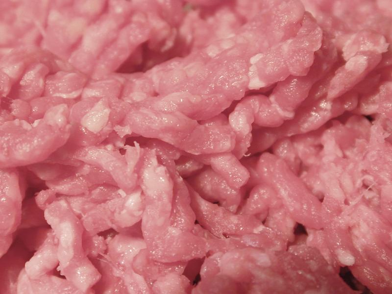 Free Stock Photo: Closeup background texture of raw mince meat in a food and catering concept