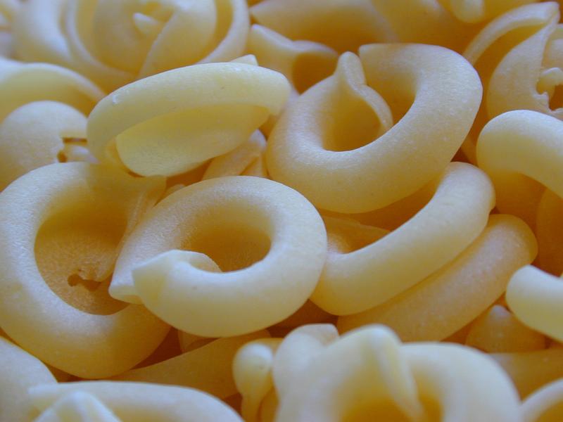 Free Stock Photo: Background texture of dried round Italian pasta noodles made from durum wheat dough and a rich source of carbohydrate
