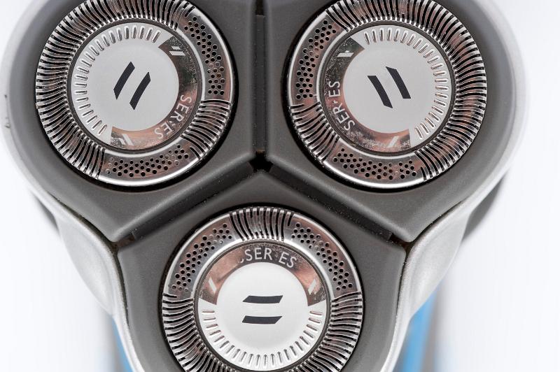 Free Stock Photo: macro close up image of the blades on a rotating electric shaver