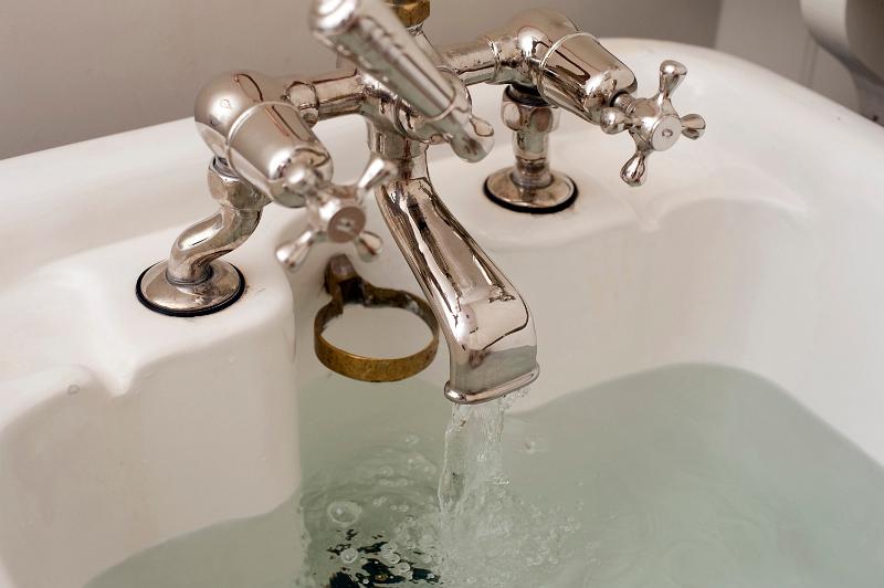 Free Stock Photo: olf fashioned bath taps with water running into the bath